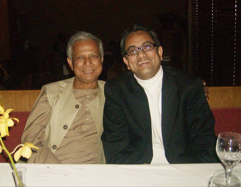 Muhammad Yunus and Neil Ghosh at an event in Kolkata, India. Photo courtesy of Neil Ghosh.